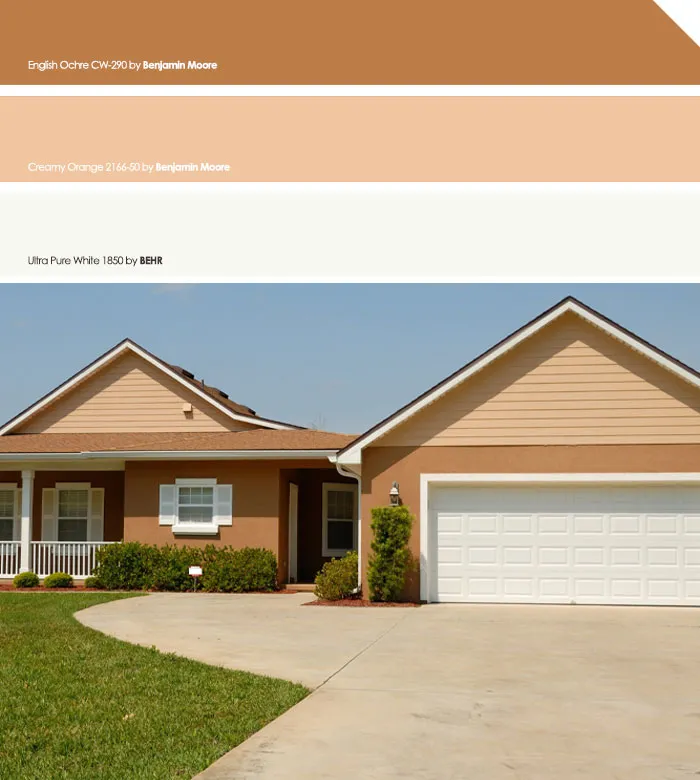 Rumah bercat warna krem dengan garasi