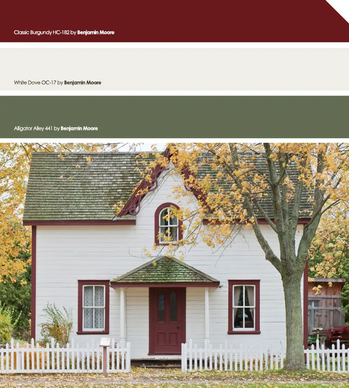 Rumah putih dengan daun jendela merah tua