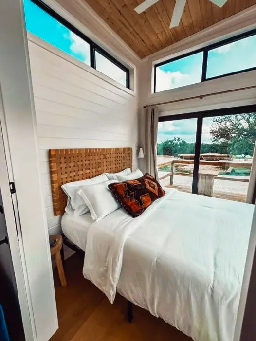the getaway tiny home is a modern mini escape with downstairs bedroom and cozy loft 6