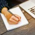 Ilustrasi Menulis Notebook
